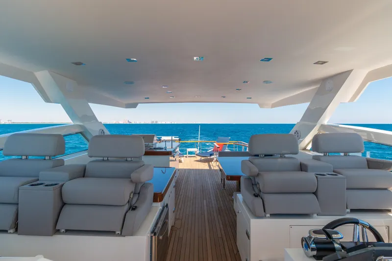 Slide: The Image of Luxurious 2012 Lazzara Breeze yacht interior with ocean view and modern seating. - 37