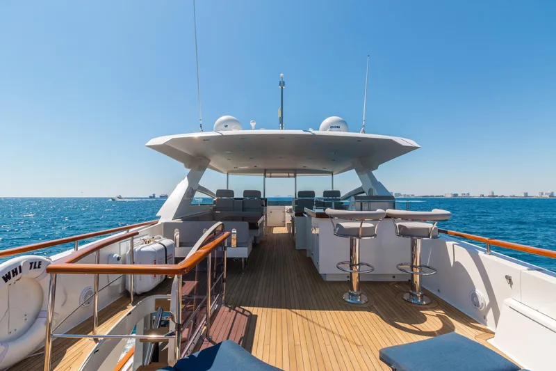 Slide: The Image of Luxurious 2012 Lazzara Breeze yacht deck with ocean view and seating area. - 39