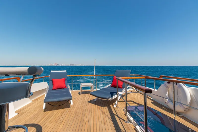 Slide: The Image of Luxurious 2012 Lazzara Breeze yacht deck with sun loungers and ocean view. - 40