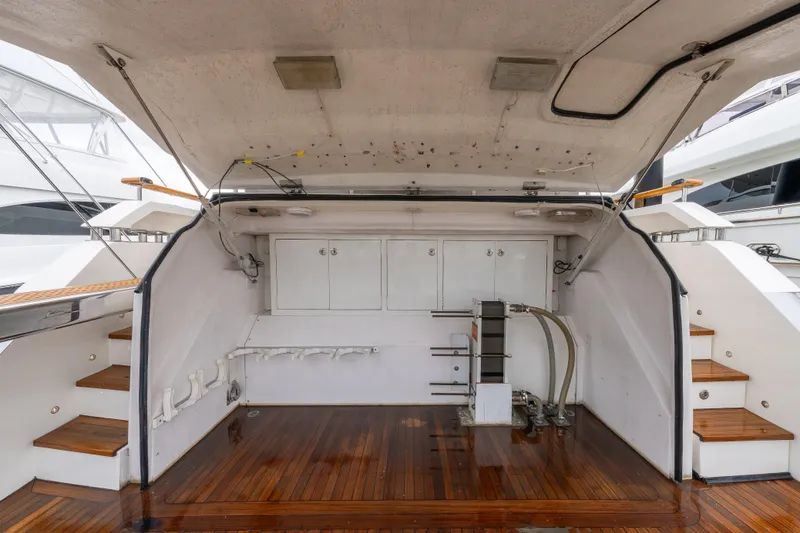 Slide: The Image of 2012 Lazzara Breeze yacht interior with wooden flooring and storage compartments. - 47