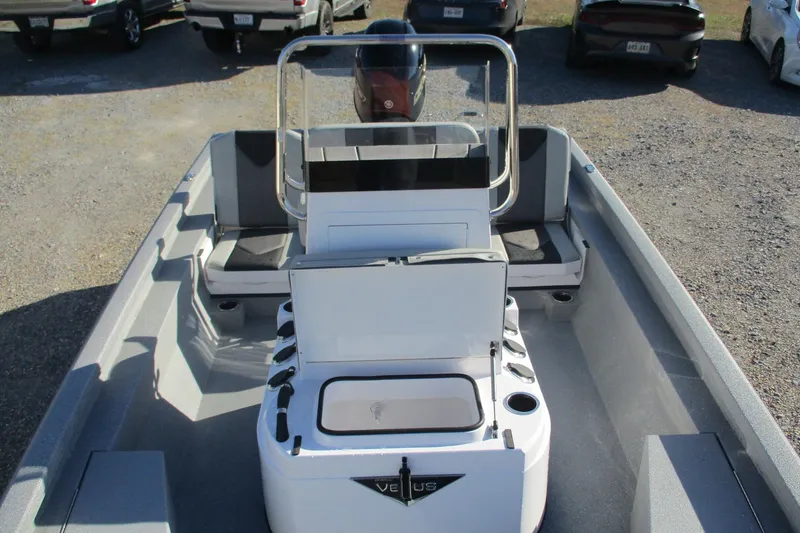 Slide: The Image of 2026 Vexus Defender 201 boat interior with seating and storage compartments. - 14
