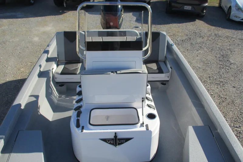 Slide: The Image of 2026 Vexus Defender 201 boat interior with seating and storage compartments. - 15