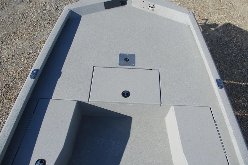 Slide: The Image of 2026 Vexus Defender 201 boat interior with storage compartments, gray finish. - 16