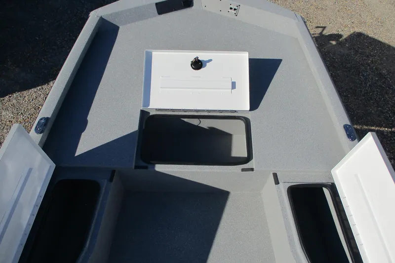 Slide: The Image of 2026 Vexus Defender 201 boat storage compartments, open hatches, and spacious deck layout. - 8