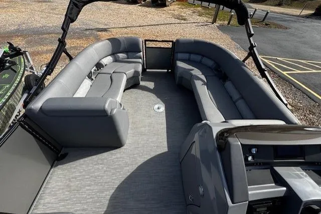 Slide: The Image of 2022 Bennington 23 LSB pontoon boat with spacious seating and modern design. - 6