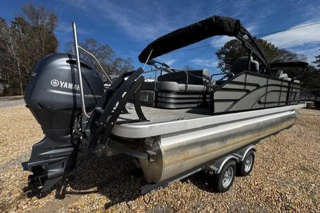 Slide: The Image of 2022 Bennington 23 LSB pontoon boat with Yamaha engine on a trailer. - 3