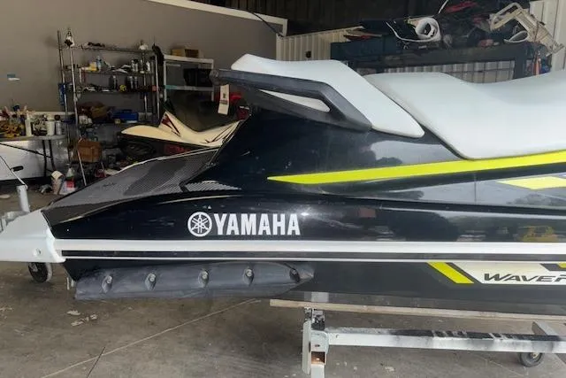 Slide: The Image of 2019 Yamaha WaveRunner VX Deluxe in a garage setting. - 6