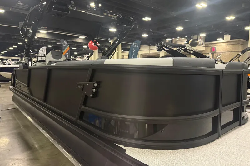 Slide: The Image of 2026 Alera M25Q boat interior with modern seating and sleek design. - 11