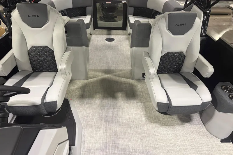 Slide: The Image of Interior of 2026 Alera M25Q boat with gray and white seating. - 5