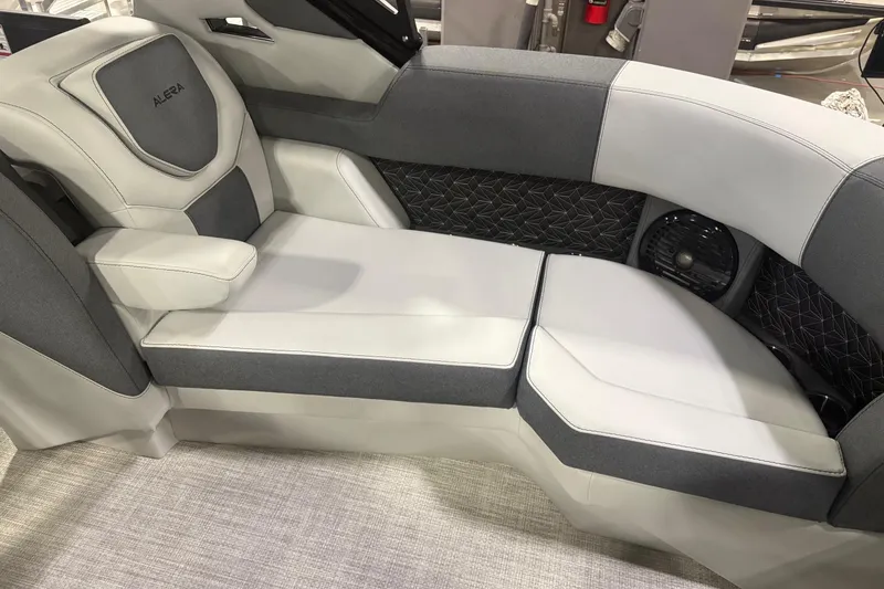 Slide: The Image of 2026 Alera M25Q boat interior with modern gray seating and sleek design. - 6