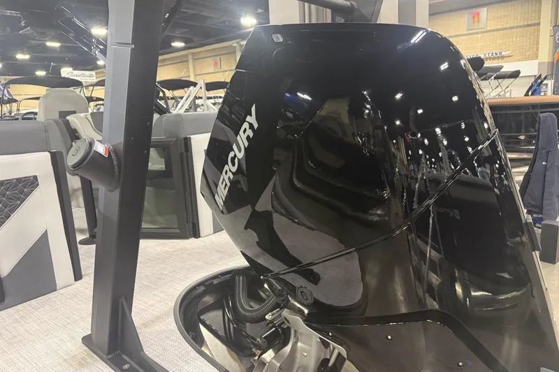 Slide: The Image of 2026 Alera M25Q boat interior with modern seating and steering console. - 9