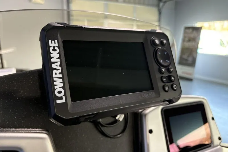 Slide: The Image of Lowrance fish finder on 2026 Tracker Pro Team 175 boat dashboard. - 17