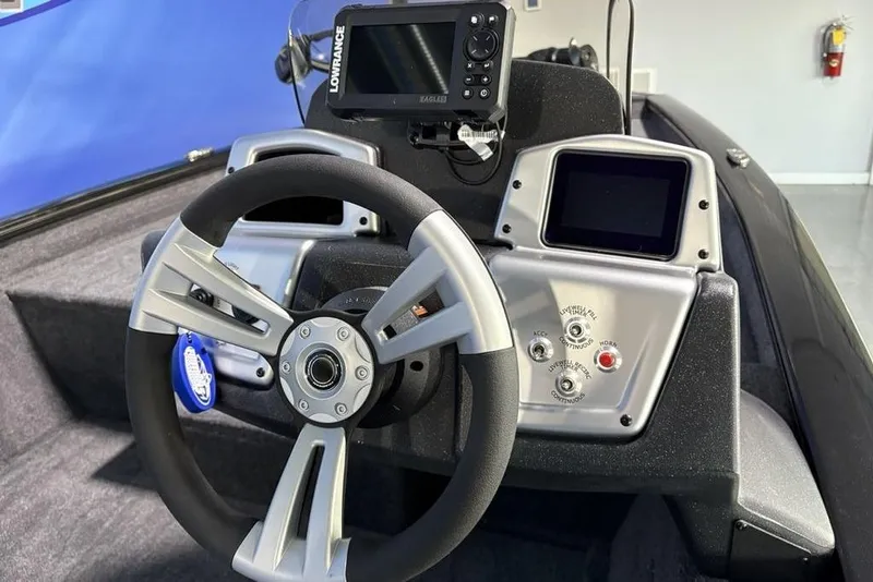 Slide: The Image of Steering console of 2026 Tracker Pro Team 175 boat with navigation system. - 18