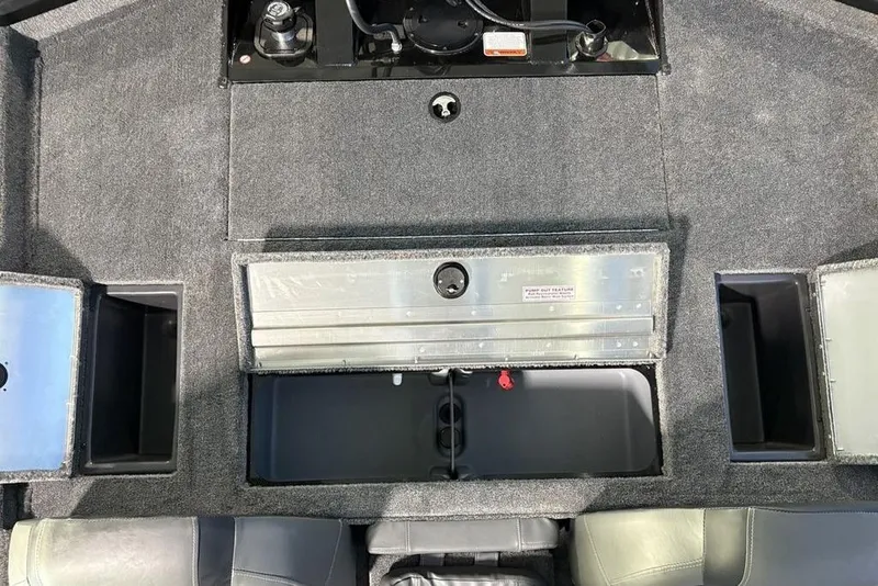Slide: The Image of 2026 Tracker Pro Team 175 boat interior with storage compartments and seating. - 23