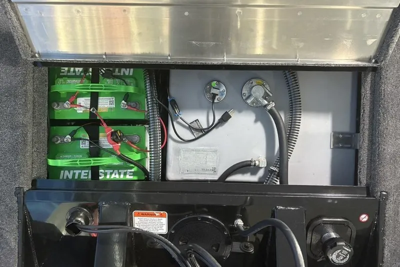 Slide: The Image of Battery compartment of 2026 Tracker Pro Team 175 boat with Interstate batteries. - 28