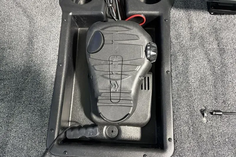 Slide: The Image of Foot pedal control on 2026 Tracker Pro Team 175 boat, featuring textured surface and dial. - 7
