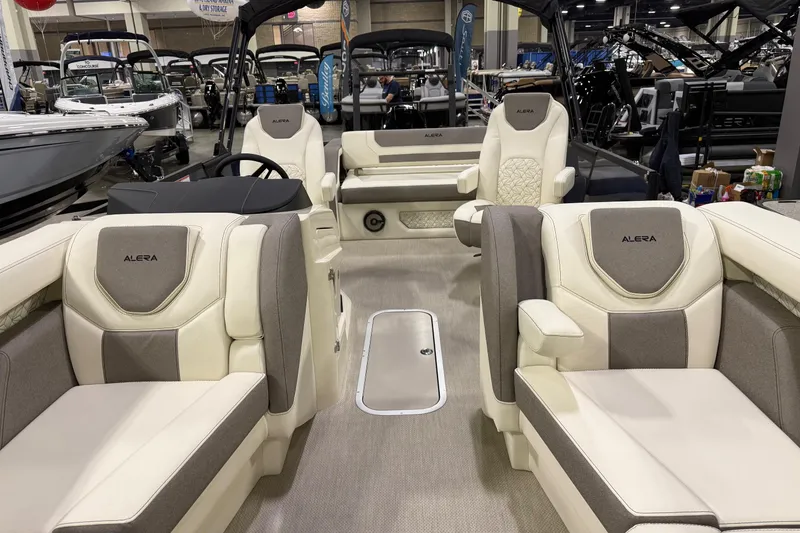 Slide: The Image of Luxurious interior of 2026 Alera M23L boat with plush seating and modern design. - 13