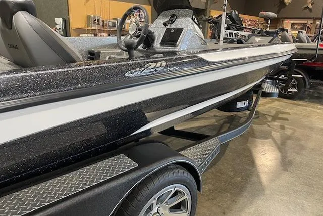 Slide: The Image of 2026 Caymas CX 20 boat in showroom, featuring sleek design and modern detailing. - 4