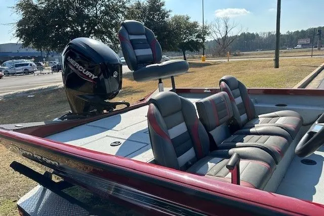 Slide: The Image of 2020 Ranger RT178 boat with Mercury engine, featuring red and gray seating. - 5