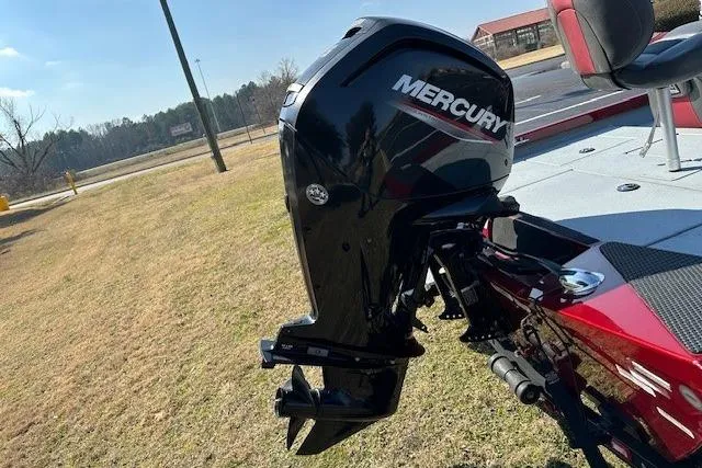 Slide: The Image of 2020 Ranger RT178 boat with Mercury outboard motor on grassy area. - 7