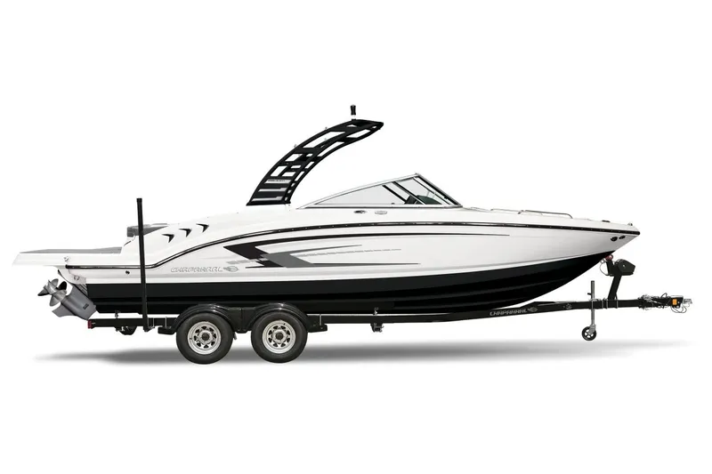 Slide: The Image of Manufacturer Provided Image: 2026 Chaparral 23 SSi boat on trailer, sleek design, black and white color scheme. - 12