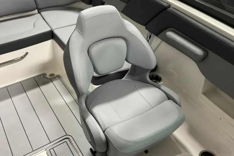Slide: The Image of 2026 Chaparral 23 SSi boat interior with sleek, modern seating design. - 20