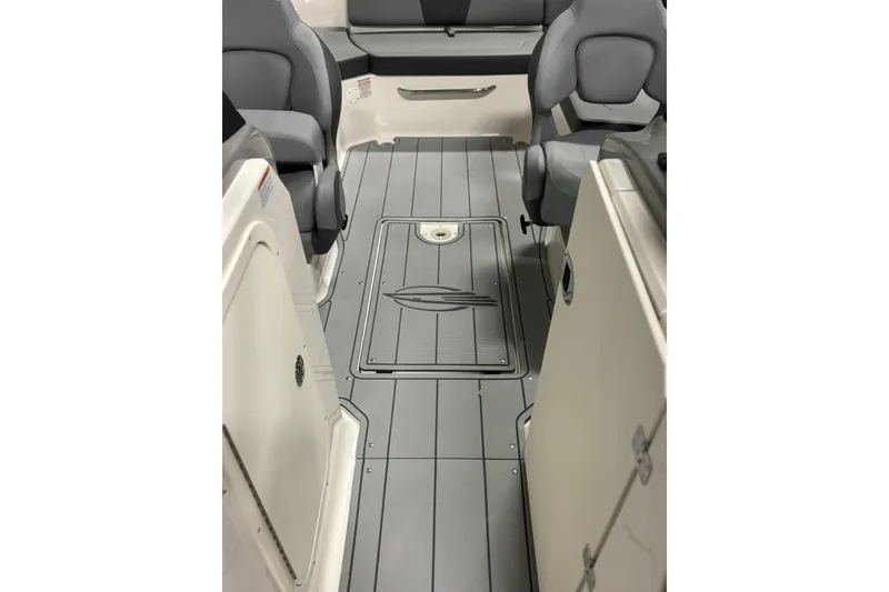 Slide: The Image of 2026 Chaparral 23 SSi boat interior with gray seating and flooring. - 34