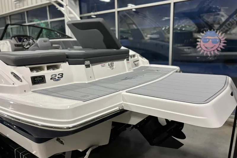 Slide: The Image of 2026 Chaparral 23 SSi boat with sleek design and spacious deck. - 9