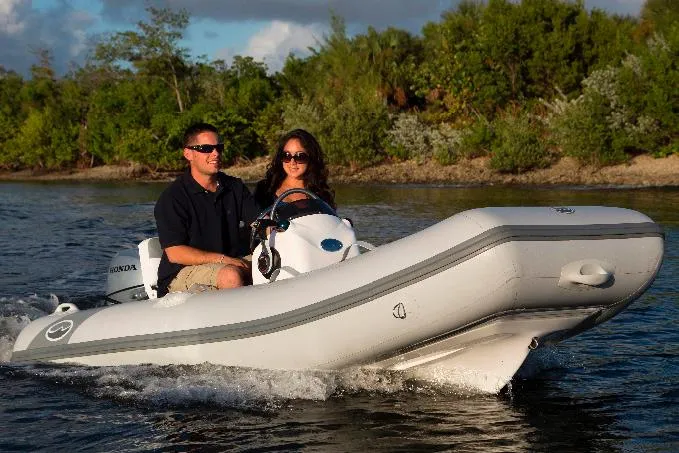 The Image of 2024 Walker Bay Odyssey 325 ST on the water. - 0