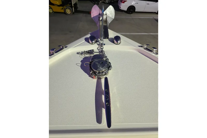 Slide: The Image of Bow of 2020 Mako 284 Center Console with anchor and chain. - 28