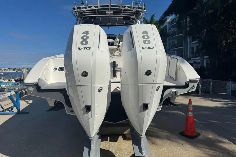 Slide: The Image of 2007 Fountain 33 Sportfish Cruiser with dual Mercury 400 V10 engines, docked outdoors. - 7