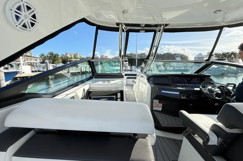 Slide: The Image of Interior view of 2022 Monterey 385SS Super Sport boat, featuring sleek design and modern controls. - 14