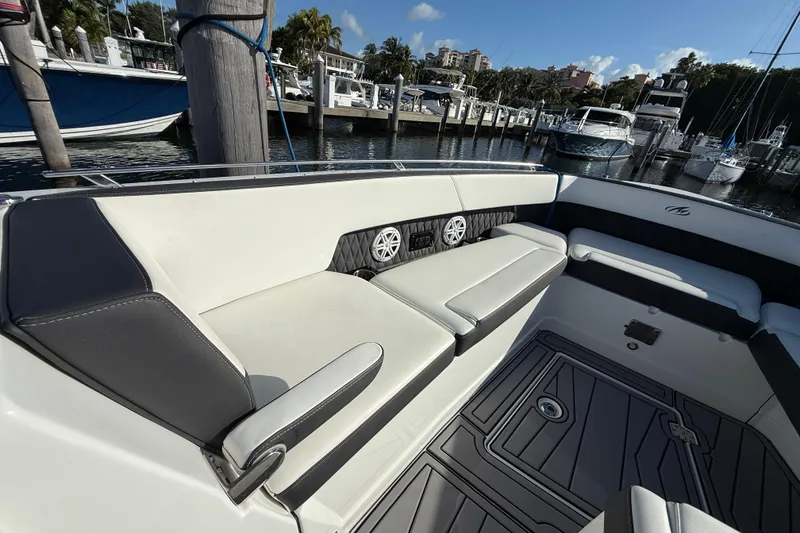 Slide: The Image of Luxurious seating on 2022 Monterey 385SS Super Sport boat docked at marina. - 21