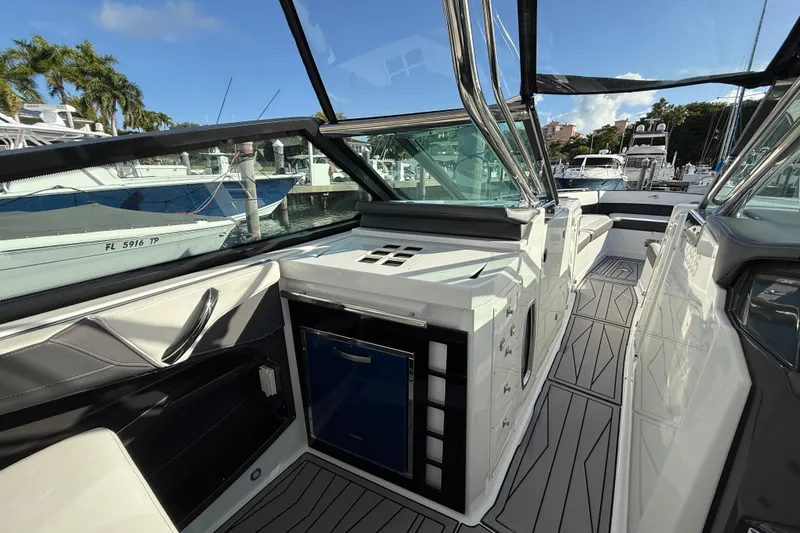 Slide: The Image of 2022 Monterey 385SS Super Sport boat interior with sleek design and modern amenities. - 46