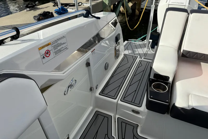 Slide: The Image of 2022 Monterey 385SS Super Sport boat interior with seating and deck details. - 50