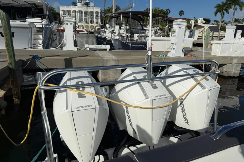 Slide: The Image of 2022 Monterey 385SS Super Sport with triple Mercury outboard engines at marina dock. - 52