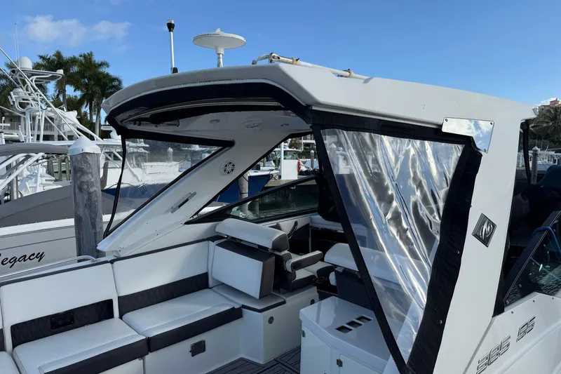 Slide: The Image of 2022 Monterey 385SS Super Sport boat with sleek seating and clear canopy. - 53