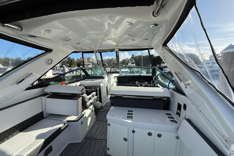 Slide: The Image of 2022 Monterey 385SS Super Sport boat interior with luxurious seating and modern design. - 8