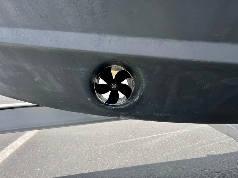 Slide: The Image of Bow thruster on a 2019 Regal 26 XO boat, close-up view. - 13