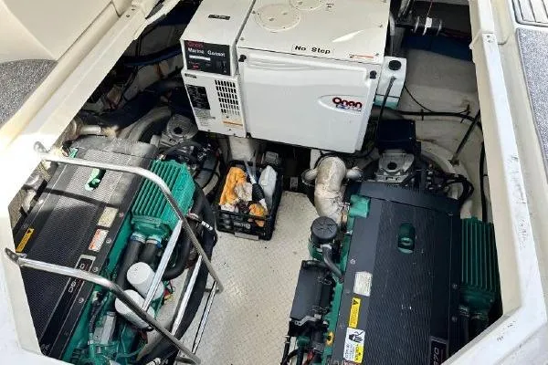 Slide: The Image of Engine room of a 2005 Cruisers 420 yacht with dual engines and generator. - 58