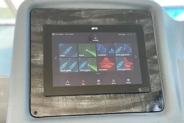 Slide: The Image of Touchscreen navigation display on 2005 Cruisers 420 yacht dashboard. - 59