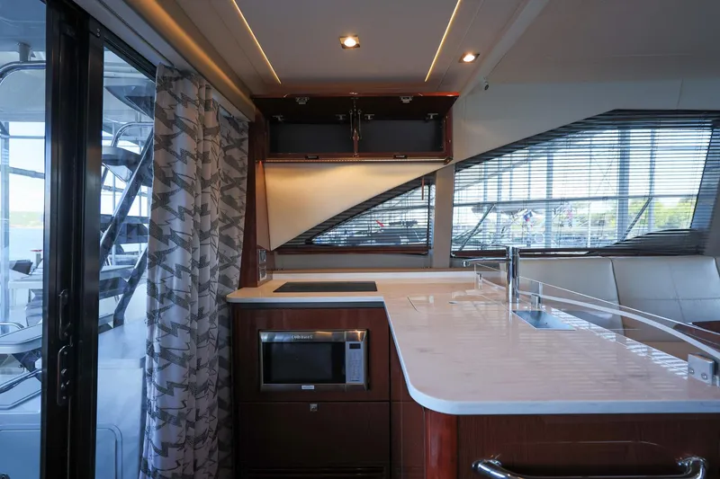Slide: The Image of Luxurious 2018 Sea Ray Fly 460 yacht interior with modern kitchen and sleek design. - 24