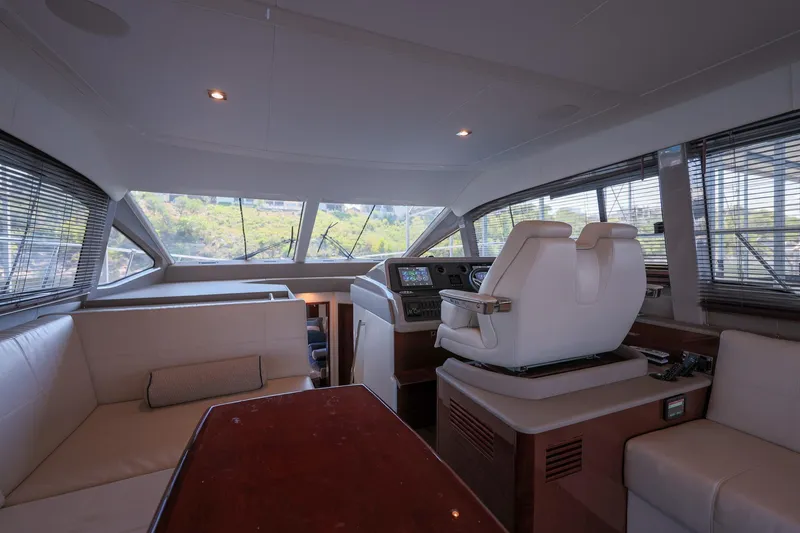 Slide: The Image of Luxurious interior of 2018 Sea Ray Fly 460 yacht with modern helm and seating. - 35
