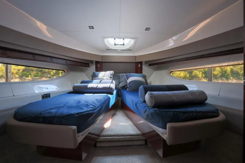 Slide: The Image of Luxurious 2018 Sea Ray Fly 460 yacht cabin with twin beds and scenic windows. - 42