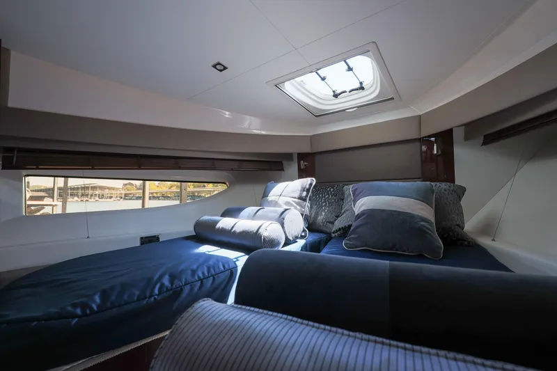 Slide: The Image of Luxurious interior cabin of 2018 Sea Ray Fly 460 yacht with plush bedding. - 43