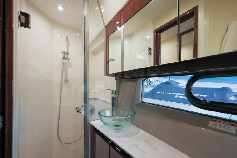 Slide: The Image of Luxurious bathroom in 2018 Sea Ray Fly 460 yacht with glass sink and shower. - 46