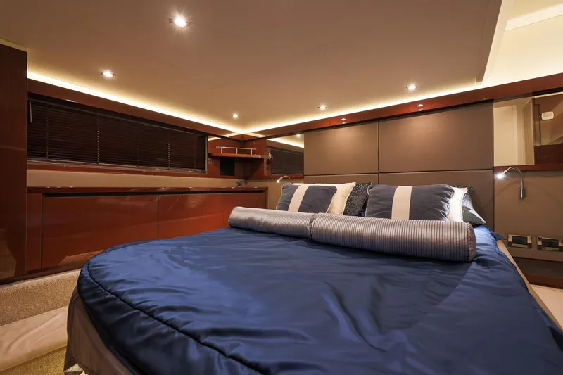 Slide: The Image of Luxurious bedroom interior of 2018 Sea Ray Fly 460 yacht with elegant lighting and bedding. - 47