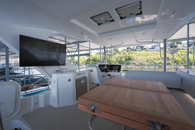 Slide: The Image of Luxurious 2018 Sea Ray Fly 460 yacht interior with modern amenities and scenic view. - 50