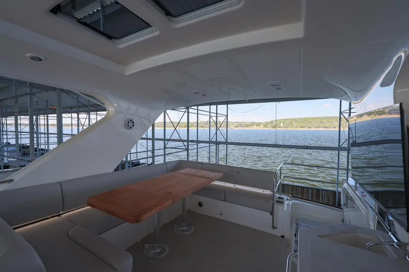 Slide: The Image of Luxurious 2018 Sea Ray Fly 460 yacht interior with scenic water view. - 55