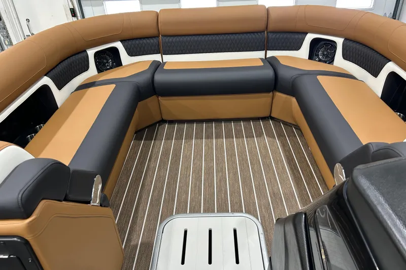 Slide: The Image of 2026 Premier 250 Solaris RS pontoon boat with sleek design and sturdy ladder. - 10